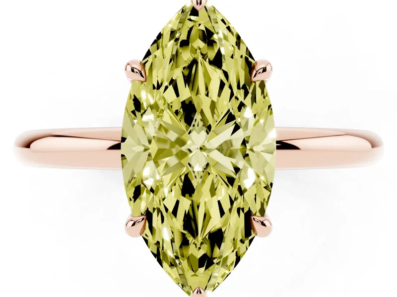 Fancy Yellow Marquise Cut Diamond Solitaire Ring Set in Rose gold with Thin Band and Prong Setting