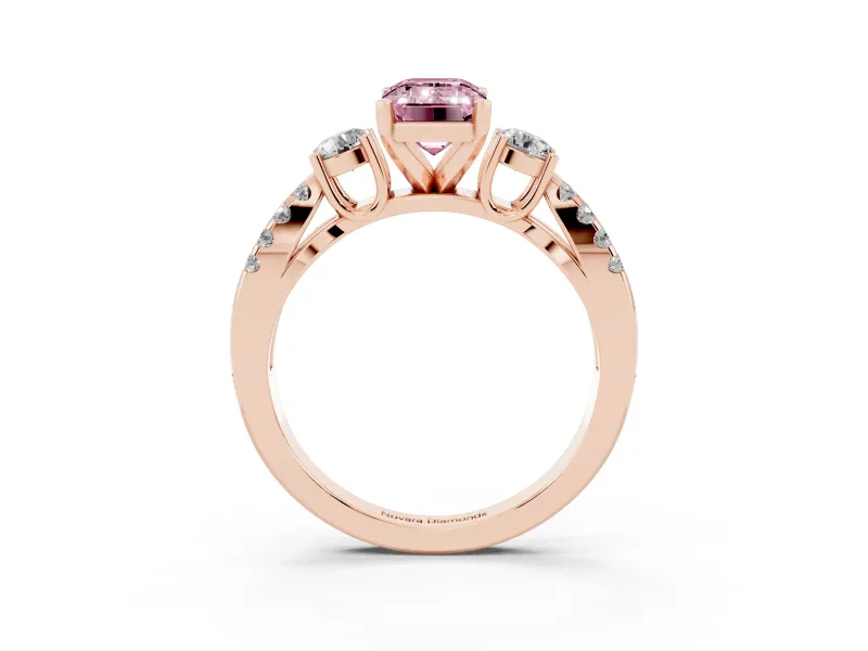 Fancy Pink Emerald Cut Diamond Three-Stone Ring Set in Rose gold with Pavé Split Shank and Prong Setting