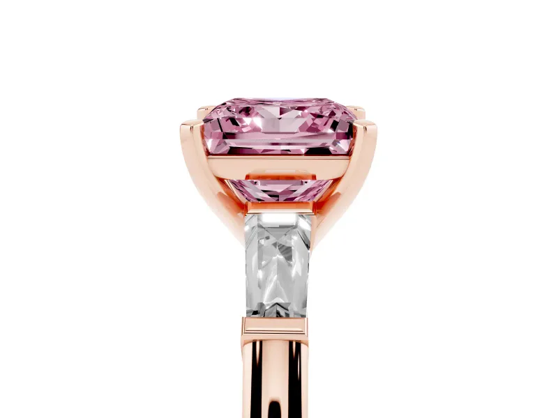 Fancy Pink Princess Cut Diamond Solitaire Ring Set in Rose gold with Tapered Baguette Side Stones and Prong Setting