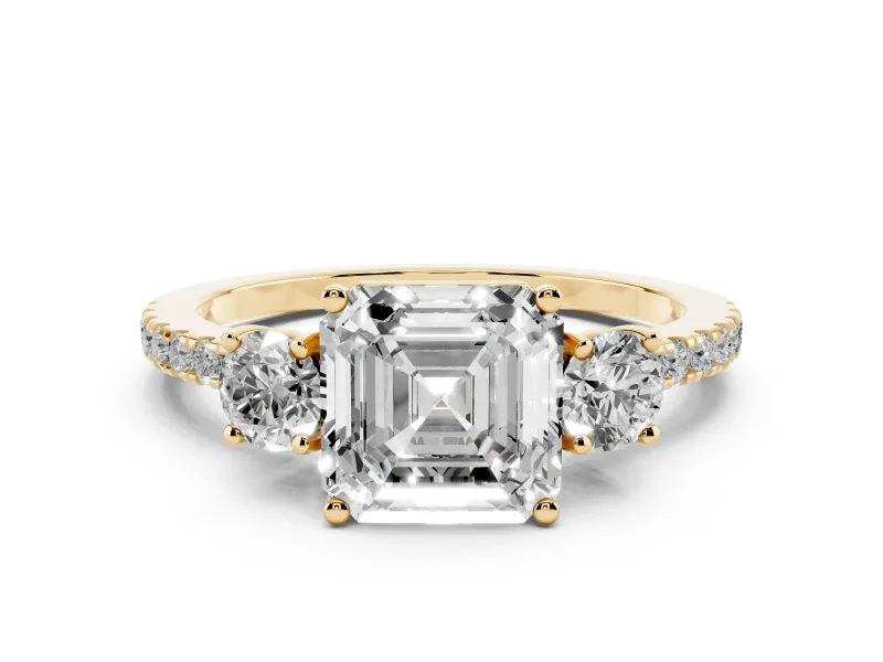 Asscher Cut Diamond Three-Stone Ring Set in Yellow gold with Pavé Band and Graduated Sides