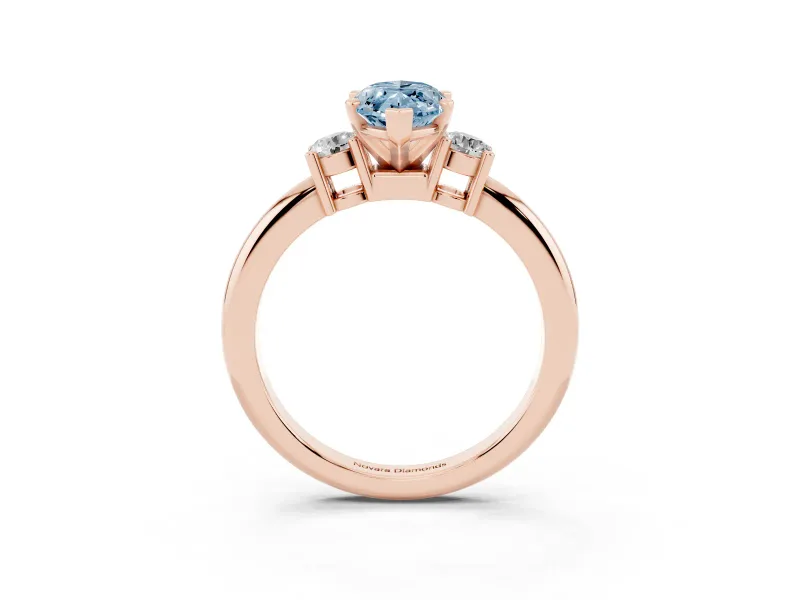 Fancy Blue Three-Stone Marquise Cut Diamond Ring Set in Rose gold with Prong Setting and Plain Band