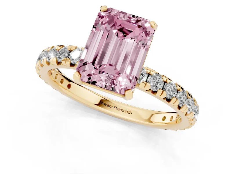 Fancy Pink Emerald Cut Diamond Pavé Solitaire Ring Set in Yellow gold with Round Band and Prong Setting