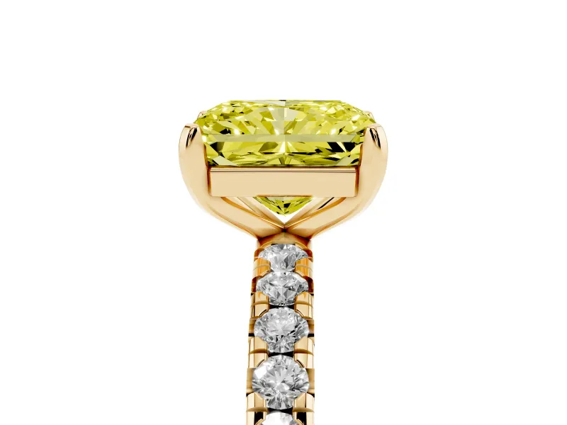 Fancy Yellow Radiant Cut Diamond Pavé Solitaire Ring Set in Yellow gold with Round Band and Prong Setting