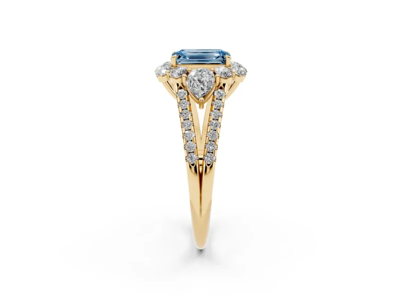 Fancy Blue Emerald Cut Diamond Halo Split Shank Engagement Ring Set in Yellow gold with Prong-Held Center Stone