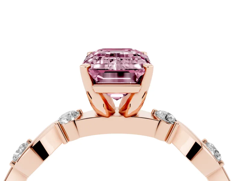 Fancy Pink Emerald Cut Diamond Solitaire Ring Set in Rose gold with Ribbon Twist Band, Round Accents and Prong Setting