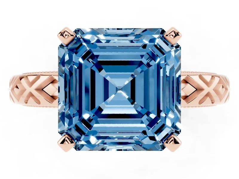 Fancy Blue Asscher Cut Diamond Solitaire Ring Set in Rose gold with Milgrain and Black Enamel X Pattern Band