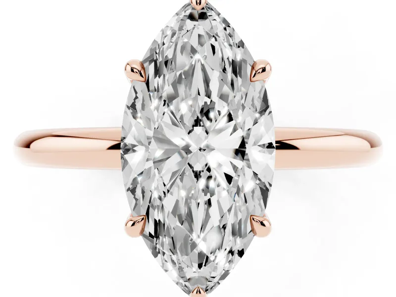 Marquise Cut Diamond Solitaire Ring Set in Rose gold with Thin Band and Prong Setting