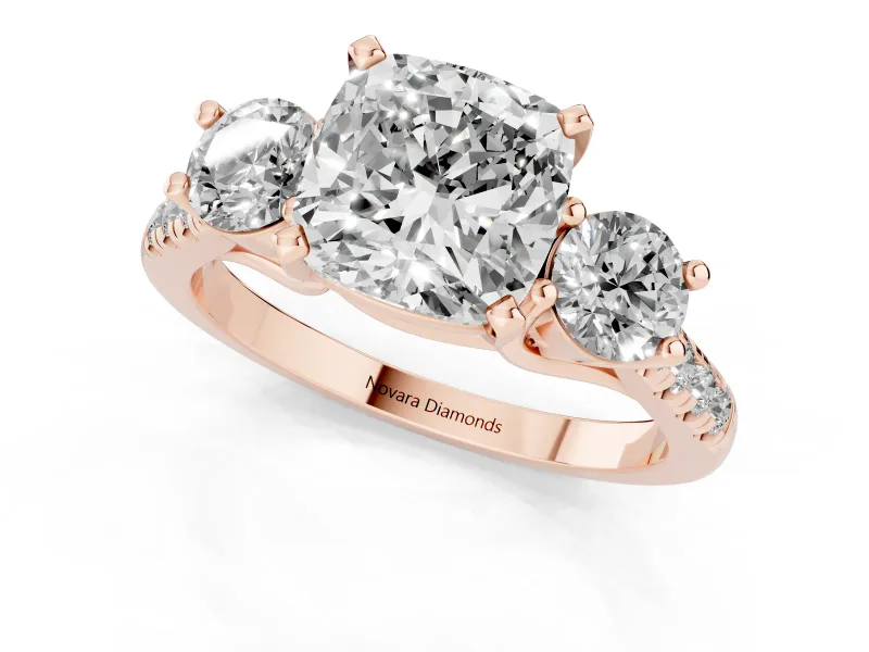 Three-Stone Cushion Cut Diamond Pavé Band Ring Set in Rose gold with Prong-Set Trio