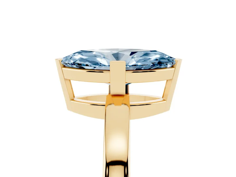 Fancy Blue Marquise Cut Diamond Solitaire Ring Set in Yellow gold with Prong Head and Smooth Polished Band