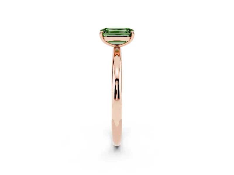 Fancy Green Emerald Cut Diamond Solitaire Ring Set in Rose gold with Prong Setting on a Polished Plain Band