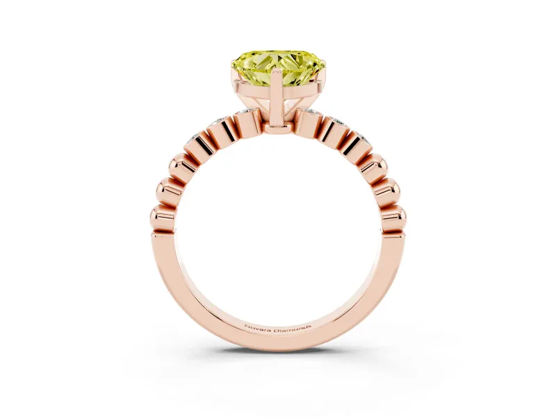 Fancy Yellow Heart Cut Diamond Solitaire Engagement Ring Set in Rose gold with Bezel Accents on Beaded Band