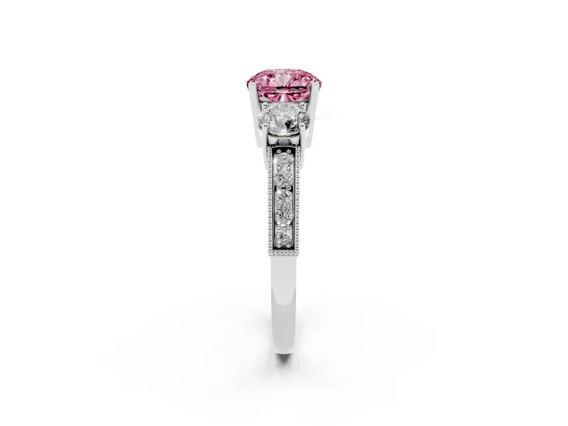 Fancy Pink Cushion Cut Diamond Three-Stone Ring Set in White gold with Round Side Stones and Pavé Band
