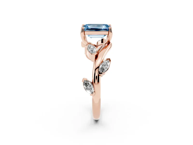 Fancy Blue Emerald Cut Diamond Solitaire Ring Set in Rose gold with Twisted Marquise Accent Band