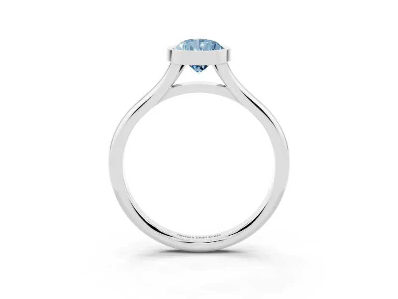 Fancy Blue Bezel Set Pear Cut Diamond Solitaire Ring Set in White gold with Tapered Band