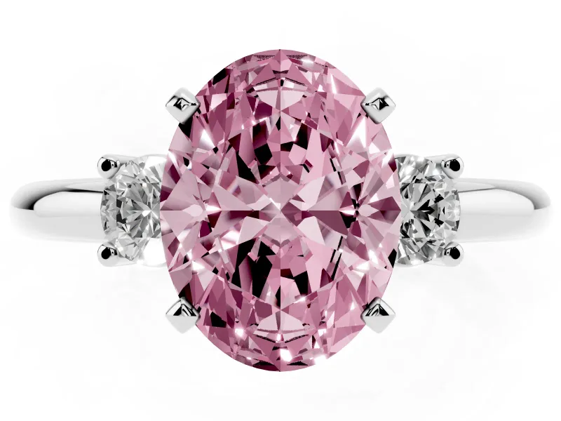 Fancy Pink Three-Stone Oval Cut Diamond Ring Set in White gold with Prong Setting and Plain Band