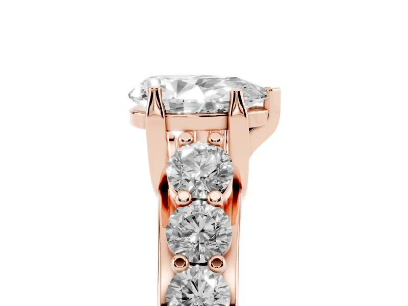 Pear-Shaped Graduated Side Stone Engagement Ring Setting | Shared Prong Rails | Rose Gold