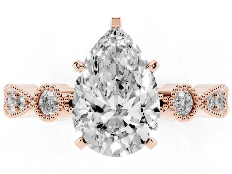 Pear Cut Diamond Solitaire Engagement Ring Set in Rose gold with Milgrain Bezel Accent Band