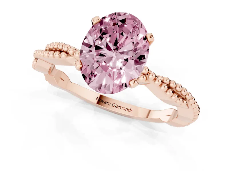 Fancy Pink Oval Cut Diamond Solitaire Ring Set in Rose gold with Twisted Band and Bead Prong Setting