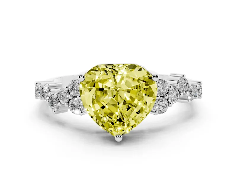 Fancy Yellow Heart Cut Diamond Ring Set in White gold with Scattered Round Accents