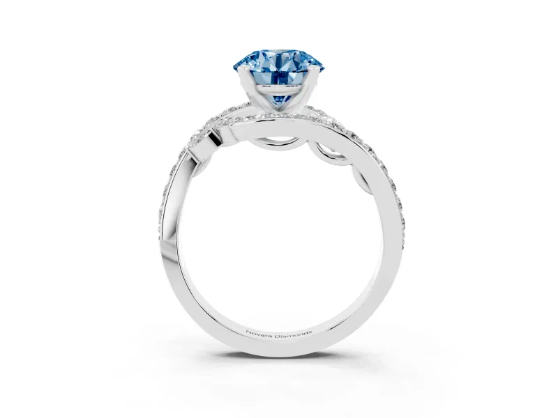 Fancy Blue Round Cut Diamond Solitaire Ring Set in White gold with Pavé Twist Band and Secure Prong Setting
