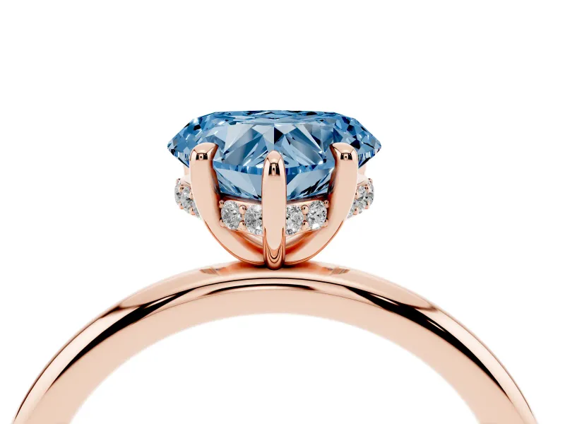 Fancy Blue Heart Cut Diamond Solitaire Ring Set in Rose gold with Thin Band and Prong Setting