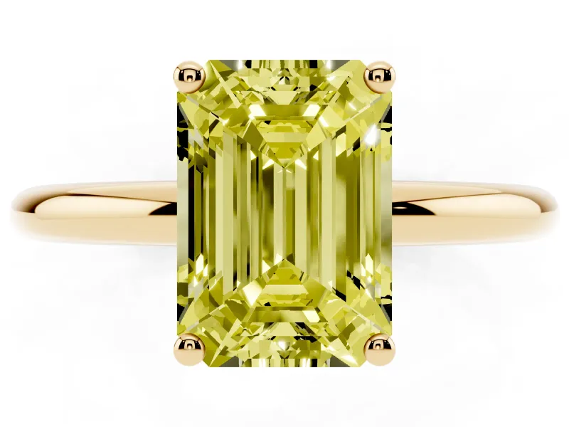 Fancy Yellow Emerald Cut Diamond Solitaire Engagement Ring Set in Yellow gold with Prong Setting and Polished Band