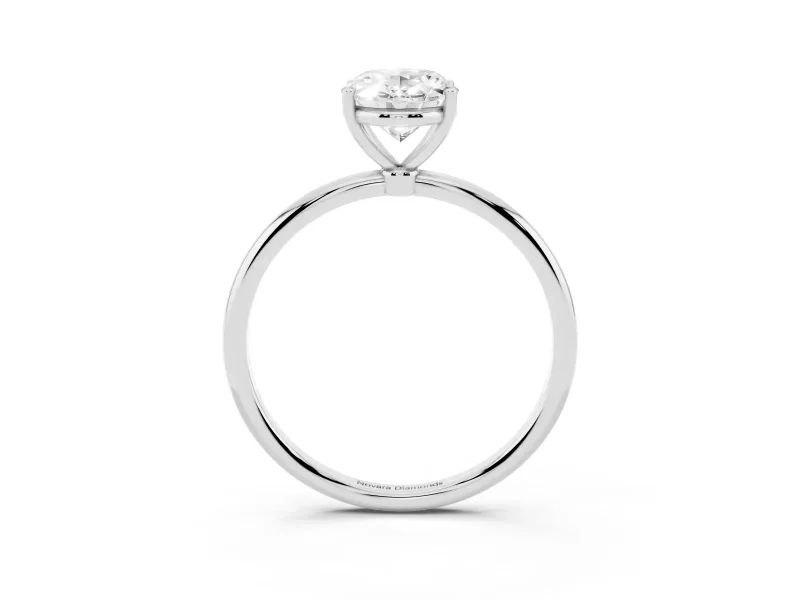 Oval Cut Diamond Solitaire Engagement Ring Set in Platinum with Thin Band and Prong Setting