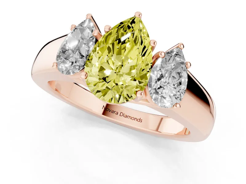 Fancy Yellow Three-Stone Pear Cut Diamond Ring Set in Rose gold with Matching Prong Settings and Plain Band