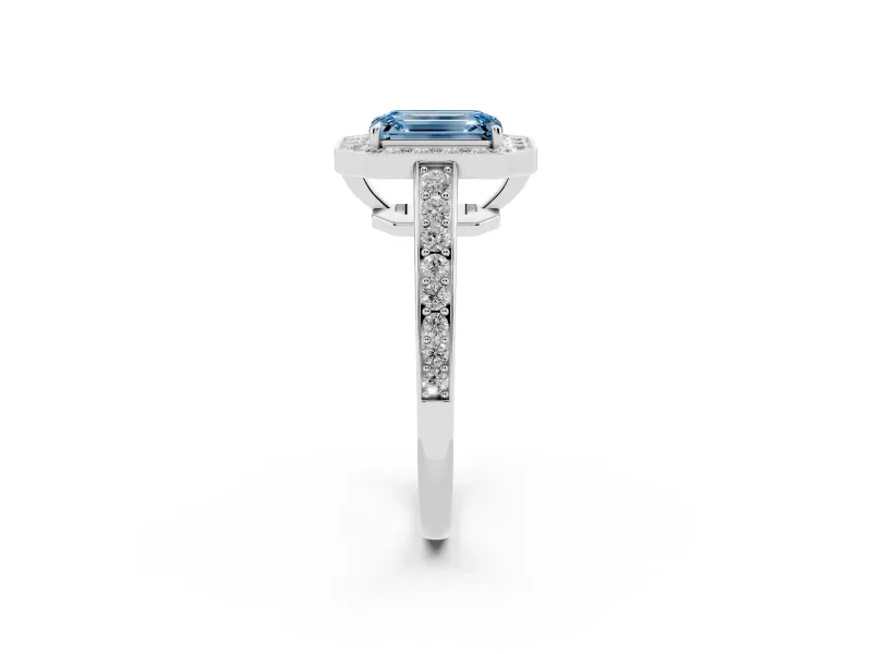 Fancy Blue Emerald Cut Diamond Halo Pavé Engagement Ring Set in White gold with Bezel Setting