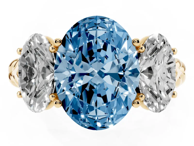 Fancy Blue Oval Cut Diamond Three-Stone Ring Set in Yellow gold with Braided Band