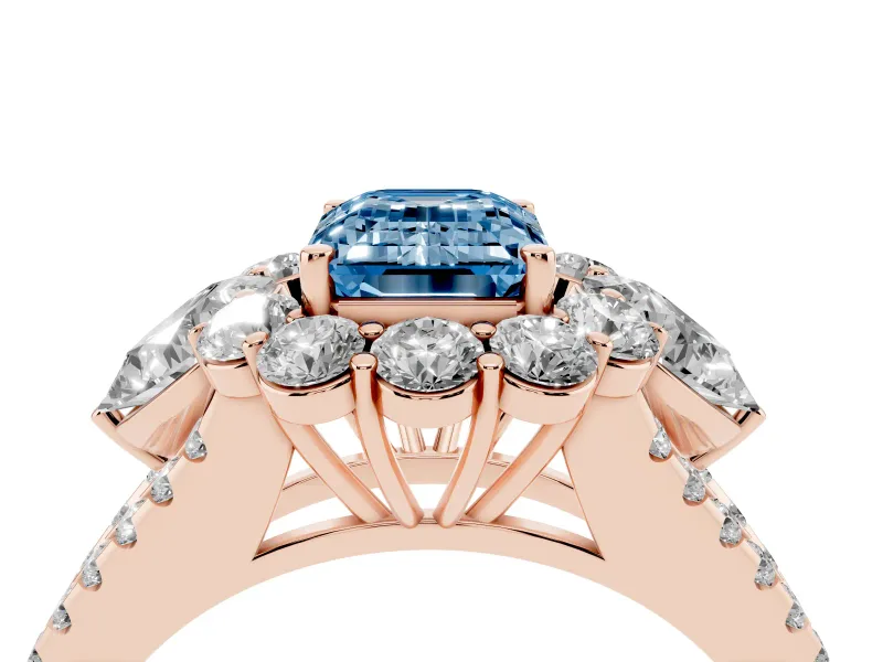 Fancy Blue Emerald Cut Diamond Halo Split Shank Engagement Ring Set in Rose gold with Prong-Held Center Stone