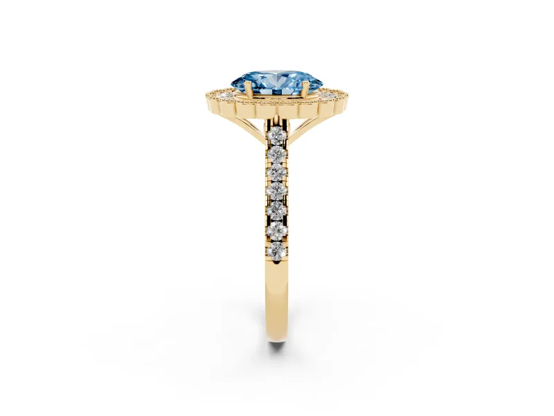Fancy Blue Oval Cut Diamond Milgrain Floral Halo Engagement Ring Set in Yellow gold with Pavé Band