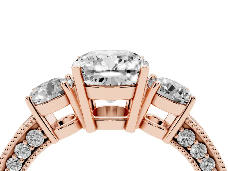 Cushion Cut Diamond Three-Stone Ring Set in Rose gold with Round Side Stones and Pavé Band
