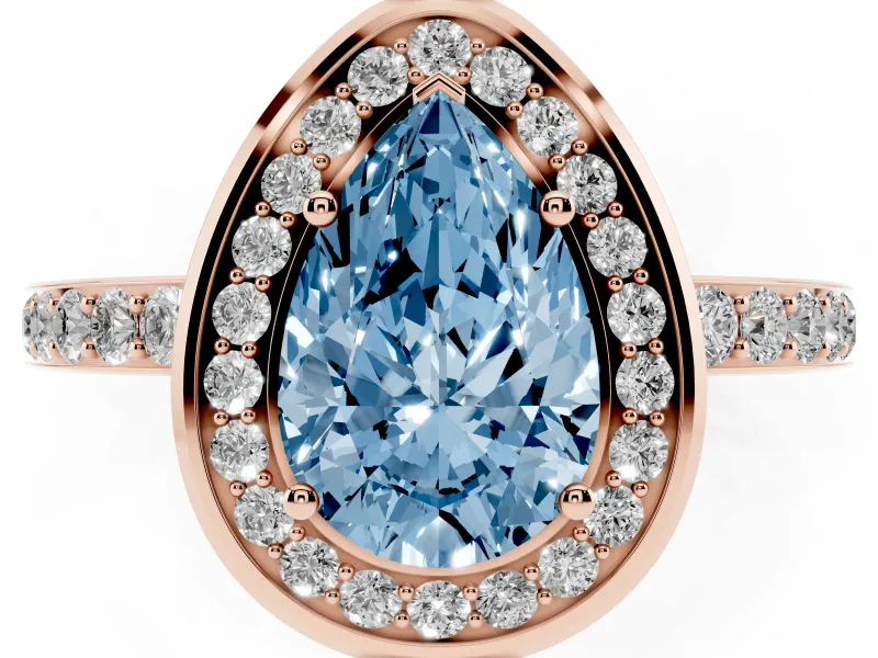 Fancy Blue Pear Cut Diamond Halo Ring Set in Rose gold with Bezel Frame and Pavé Band