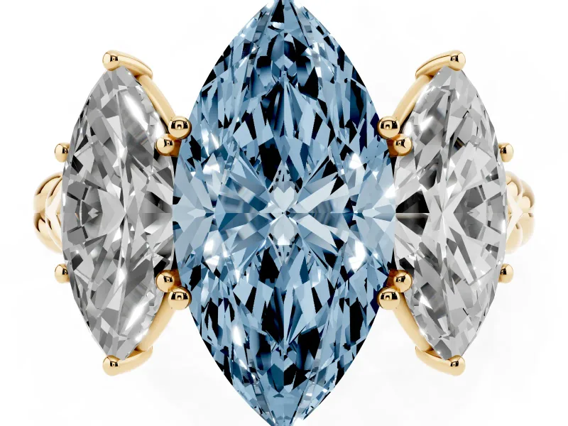 Fancy Blue Marquise Cut Diamond Three-Stone Ring Set in Yellow gold with Braided Band