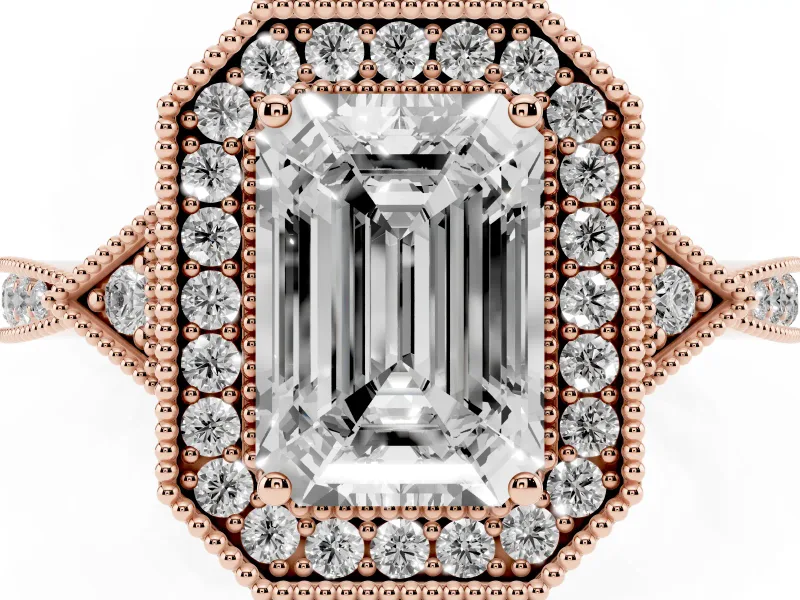 Emerald Cut Diamond Halo Engagement Ring Set in Rose gold with Milgrain Pavé Band