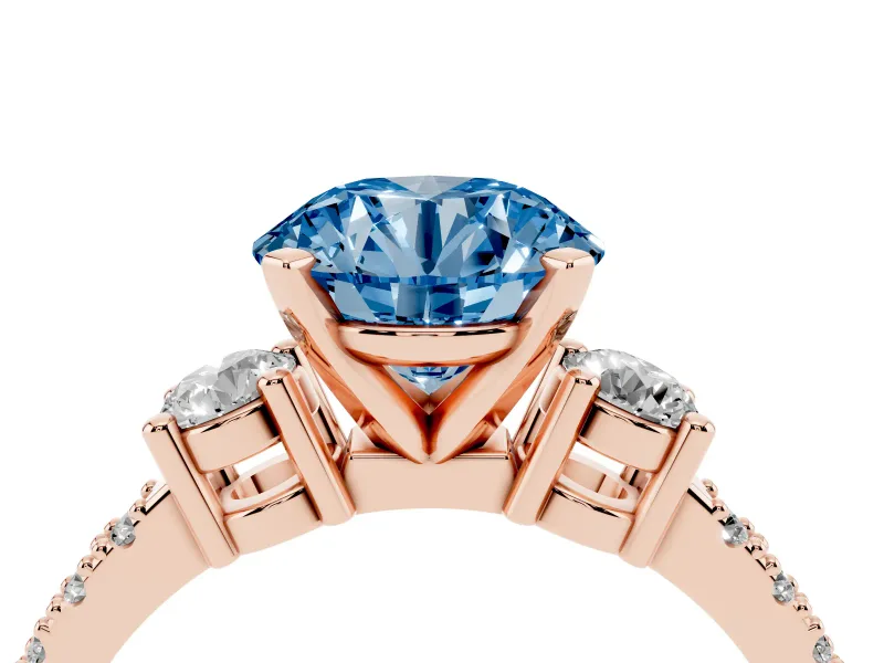 Fancy Blue Three-Stone Round Cut Diamond Pavé Band Ring Set in Rose gold with Prong Setting