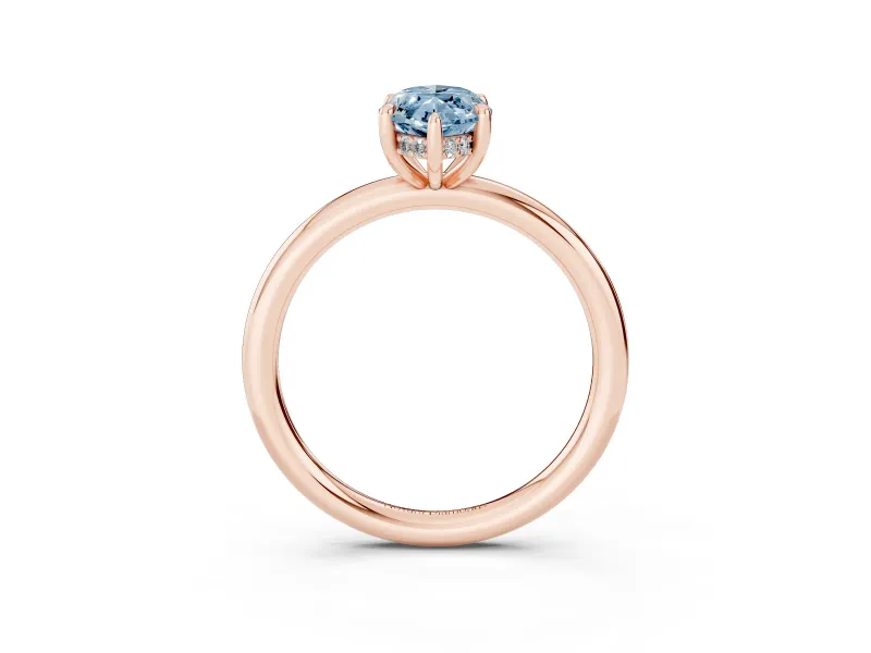 Fancy Blue Marquise Cut Diamond Solitaire Ring Set in Rose gold with Thin Band and Prong Setting