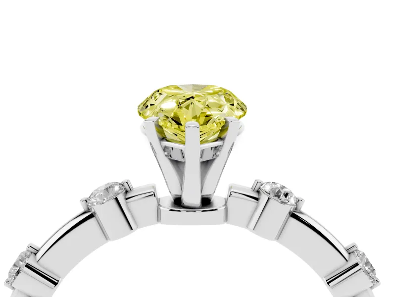 Fancy Yellow Pear Cut Diamond Solitaire Ring Set in Platinum with Bezel Set Side Stones and Prong Setting