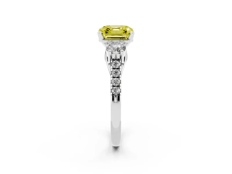 Fancy Yellow Three-Stone Asscher Cut Diamond Pavé Band Ring Set in White gold with Prong-Set Trio