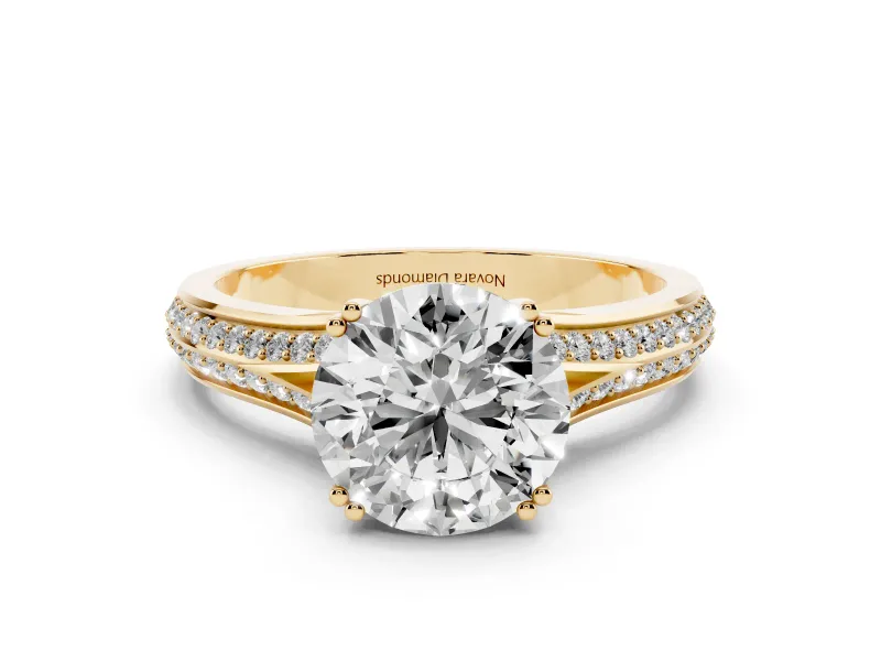Round Cut Diamond Split Shank Pavé Engagement Ring Set in Yellow gold with Prong-Set Center Stone