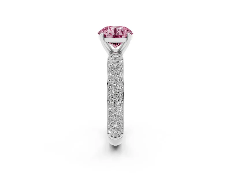 Fancy Pink Round Cut Diamond Solitaire Ring Set in Platinum with Prong Setting and Pavé-Set Band
