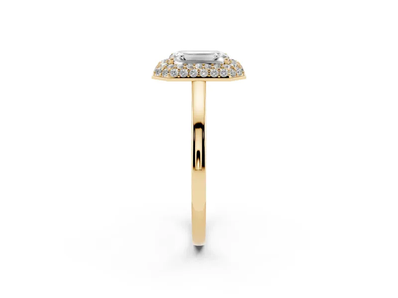 Emerald Cut Diamond Halo Engagement Ring Set in Yellow gold with Solitaire Band and Prong Setting