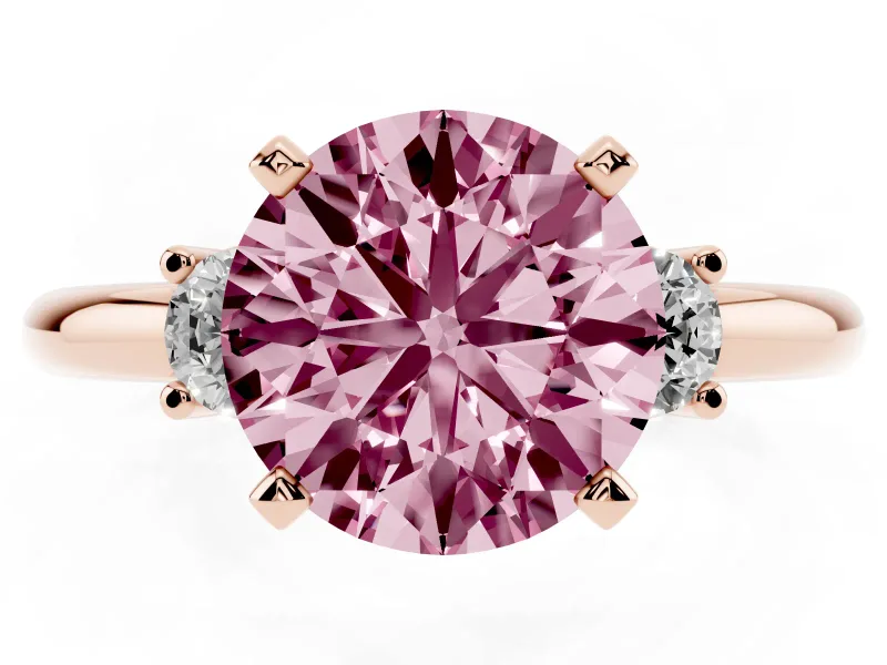 Fancy Pink Three-Stone Round Cut Diamond Ring Set in Rose gold with Prong Setting and Plain Band