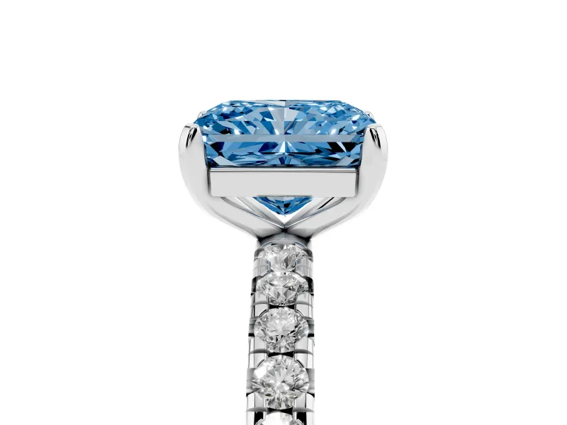 Fancy Blue Radiant Cut Diamond Pavé Solitaire Ring Set in Platinum with Round Band and Prong Setting