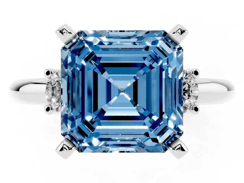 Fancy Blue Three-Stone Asscher Cut Diamond Ring Set in White gold with Prong Setting and Plain Band