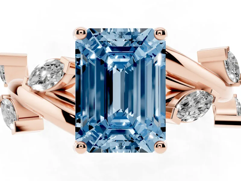 Fancy Blue Emerald Cut Diamond Solitaire Ring Set in Rose gold with Twisted Marquise Accent Band
