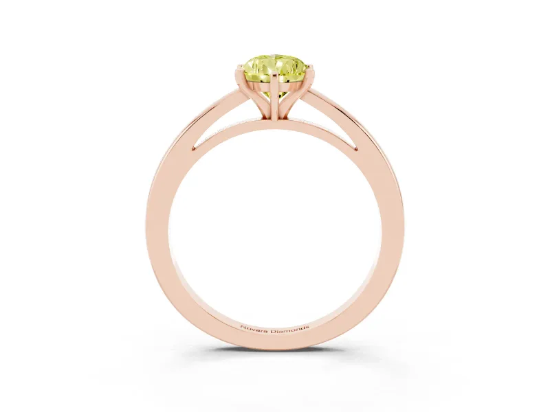 Fancy Yellow Pear Cut Diamond Solitaire Engagement Ring Set in Rose gold with Prong Setting on a Classic Band
