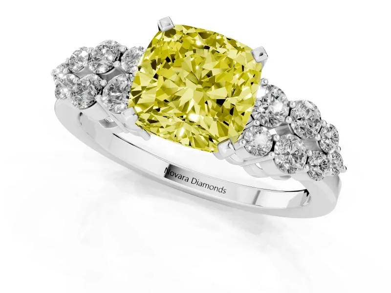 Fancy Yellow Cushion Cut Diamond Cluster Engagement Ring Set in White gold with Pavé Band and Prong Setting