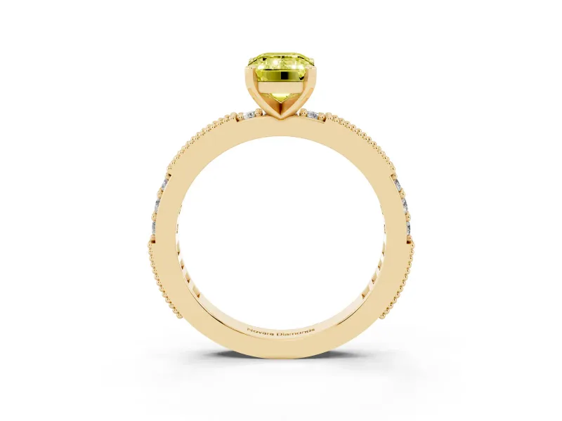 Fancy Yellow Emerald Cut Diamond Solitaire Ring Set in Yellow gold with Slim Pavé Band and Prong Setting